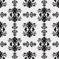 African Ikat floral paisley embroidery on white background.geometric ethnic oriental pattern traditional.Aztec style abstract vector illustration.design for texture,fabric,clothing,wrapping,carpet. 