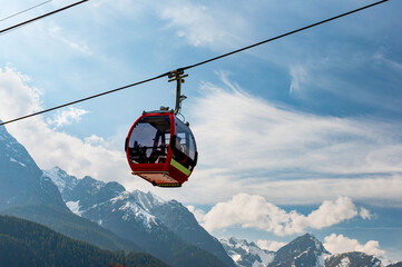 Red cable car in the Alps