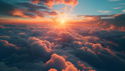 Beautiful above clouds cloudscape with a majestic sunset light during aircraft flying journey....