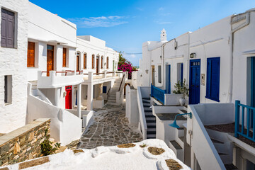 Narrow street with traditional style Greek houses in Kastro village, Sifnos island, Greece