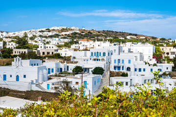 View of Artemonas village with typical white houses and hills in background, Sifnos island, Greece