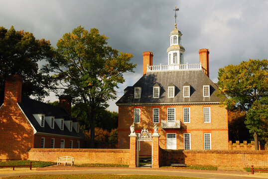 Light hits the Governors Palace in Williamsburg Virginia as a storm clears on an autumn day