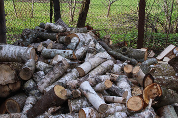 stacked dry firewood as a background