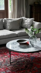 a modern living room adorned with a Persian carpet and round white rug, featuring a sleek grey sofa by a window with a wooden frame, complemented by lush plants in pots, a side table, armchair.