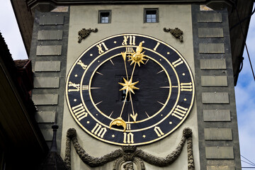 Golden and black clock in Bern, Switzerland