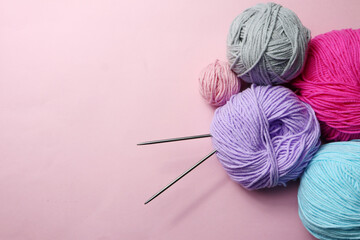 Knitting yarn  balls on color background