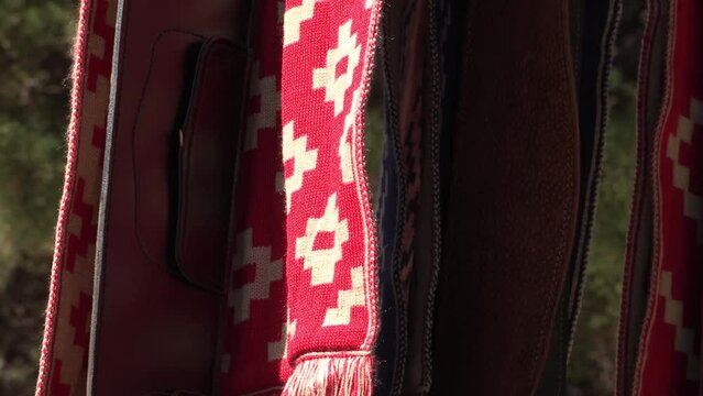 
Handmade Argentine gaucho belts. Leather belts with pampa style decorations and fabrics. Traditional accessories of the Argentine gaucho's clothing. Traditional craft fair.