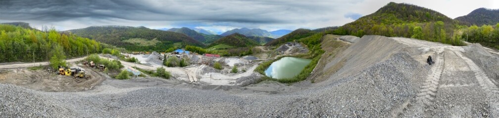 Carpathian Mountains of Ukraine, a quarry where granite sandstone is mined for the production of...