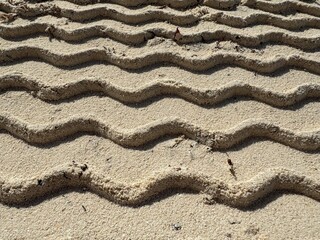 Tyre tracks were imprinted in the fine gravel 
