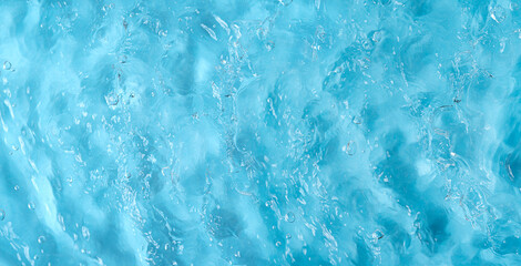 Abstract background of rippled water surface. Top view.