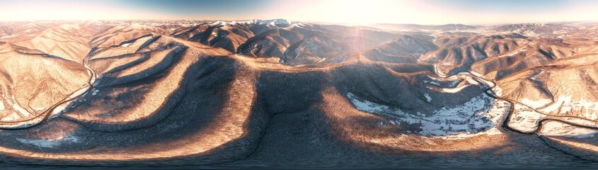 Severe frost at sunrise in the Carpathians, Transcarpathia, Ukraine. A drone flies over the tops of...