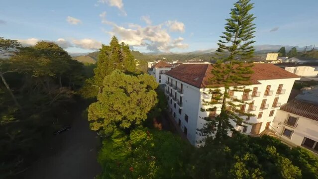 Popayan town in Colombia, close to Cali its a beautiful colonial town in white buildings and roofs that combine very good with the view from the air, drone scenes all over town and the sky, the church