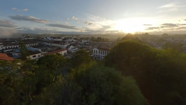 Popayan roofs, town and amazing sunset from the sky, 
White buildings antique arquitecture. 