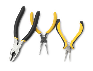 Group of different pliers isolated on white, top view