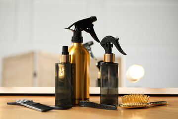 Set of hairdresser tools on table in salon