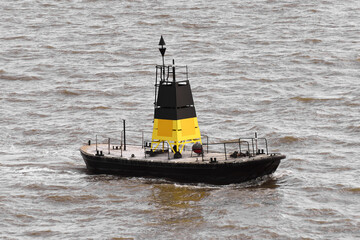 Navigation mark. East cardinal floating mark. IALA system