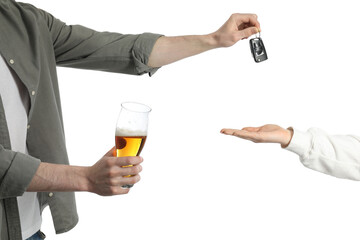Man with glass of alcoholic drink giving car key to woman on white background, closeup. Don't drink...