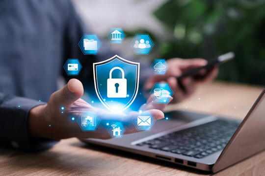 Cyber security and personal data protection concept, Businessmen show key icons in hand using laptop and smartphone to security encryption, transfer data, banking, credit card, smart home protection - Powered by Adobe