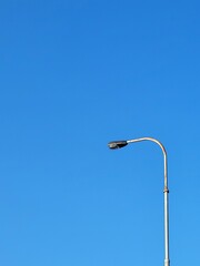 street lamp on blue sky