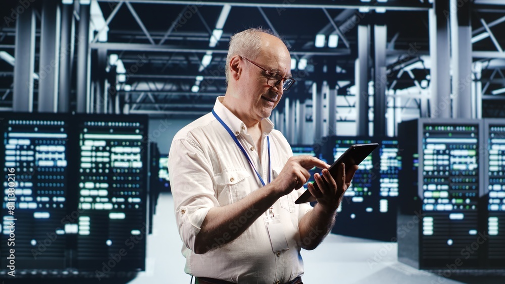 Poster older professional navigating network of server rigs in industrial cloud computing business. worker 