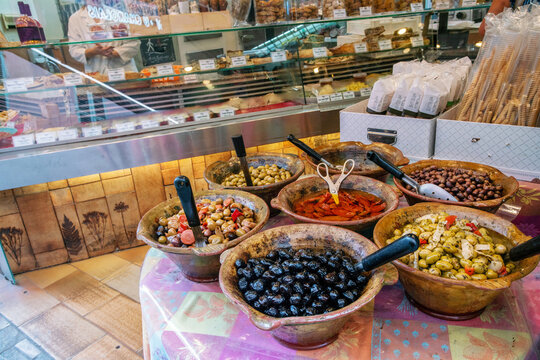 Salted (or pickled) olives odf different colors : red, brown, green and something else in middle