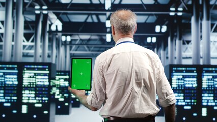 Tech savvy specialist expertly managing data while navigating through industrial supercomputers....