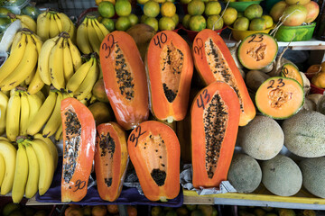 A view of papaya and melon at market