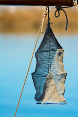 Fishing gear, or mornell in valencian language, hanging on a traditional fishing boat in the...