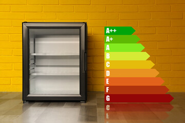 Energy efficiency rating label and refrigerator indoors