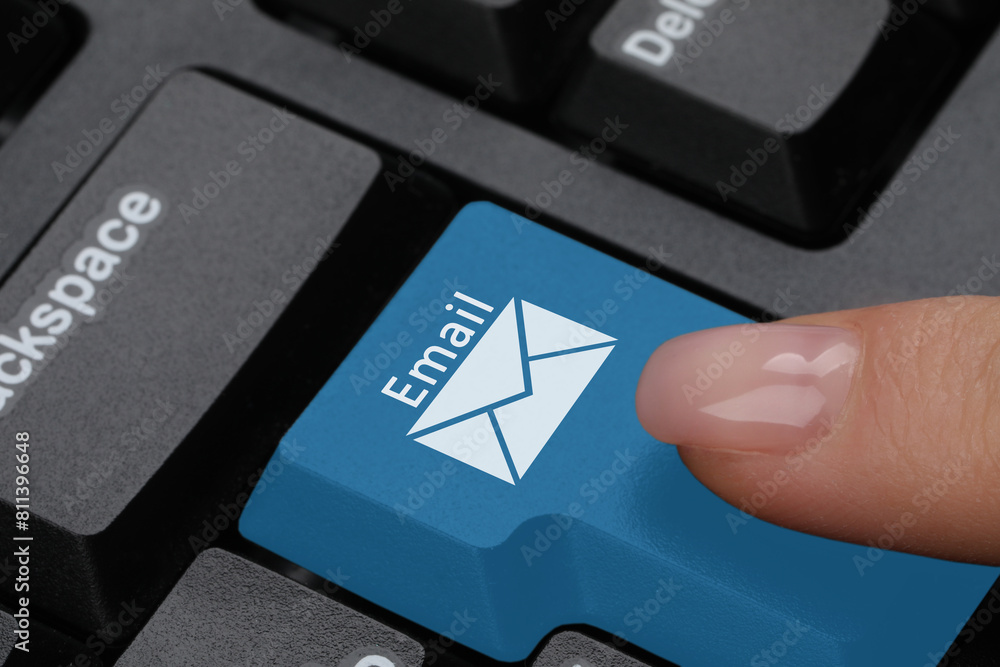 Poster woman pressing light blue button with word email and illustration of envelope on computer keyboard, 