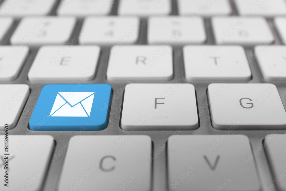 Poster email. light blue button with illustration of envelope on computer keyboard, closeup