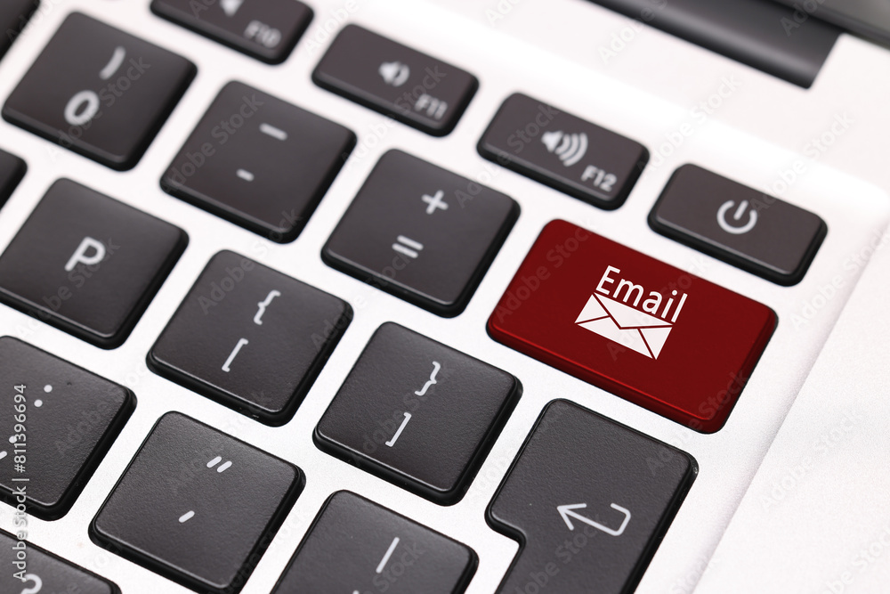 Poster red button with word email and illustration of envelope on laptop keyboard, closeup