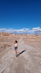 woman walking in the desert