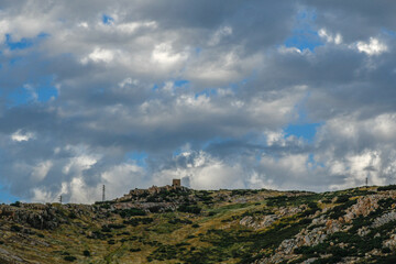 Fototapeta premium Mountain scenery with clouds at sunset, Puertollano, Ciudad Real, Spain