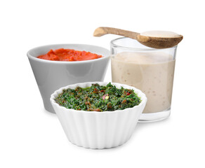 Different marinades in tableware isolated on white