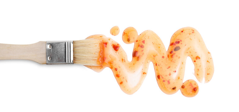 Basting brush with fresh marinade isolated on white, top view