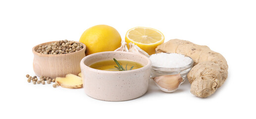 Different fresh ingredients for marinade on white background