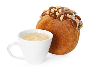 Round croissant with chocolate paste, nuts and cup of coffee isolated on white. Tasty puff pastry