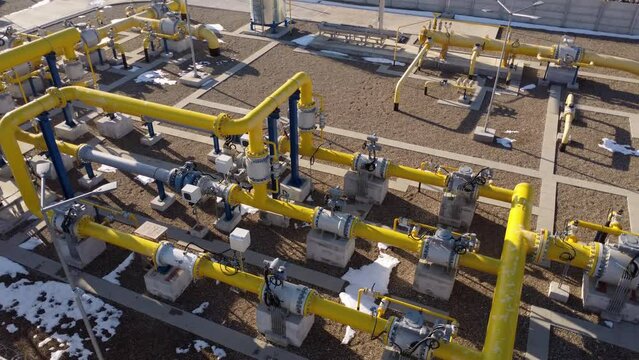 Industrial facility network vibrant yellow tubes channels various liquids manufacturing process. These pipes conduits water chemicals demonstrating intricate infrastructure supporting production.