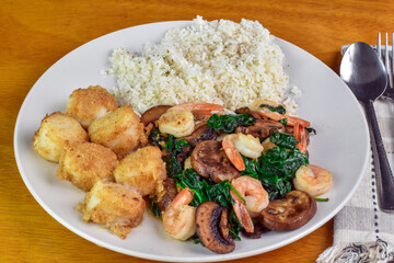sauteed shrimp ., spinach and mushrooms with scallops