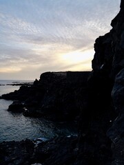 Sunset on the frozen lava coast at Punta Delioma, Las Galletas, Arona, Tenerife, Atlantic Ocean, Canary Islands, Spain