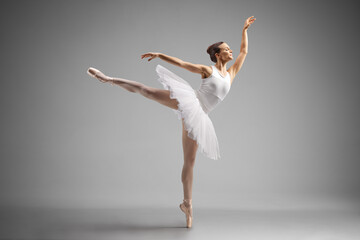 Full length shot of a graceful ballerina dancing