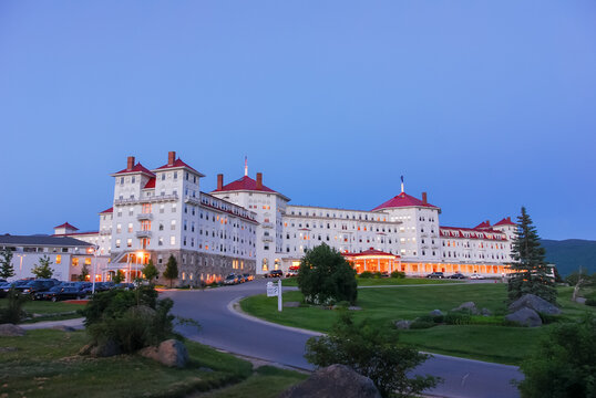 Bretton Woods, New Hampshire - USA: The Mount Washington Hotel at dusk with lights and deep blue evening sky