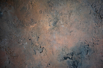 orange gray embossed texture on the wall