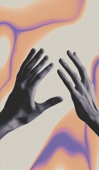 Two hands depicted in striking contrast, silhouetted against a soft, swirling backdrop of peach and purple hues, creating an abstract and visually compelling composition.