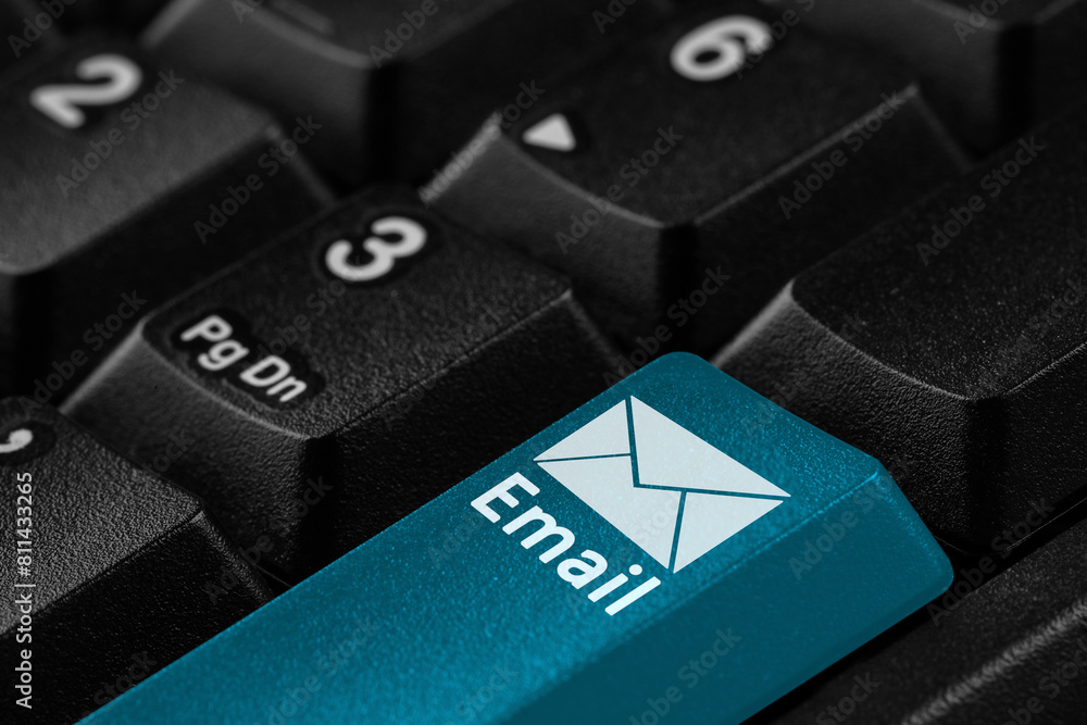Poster light blue button with word email and illustration of envelope on computer keyboard, closeup