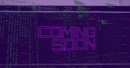 COMING SOON in purple pops amidst blurry code background