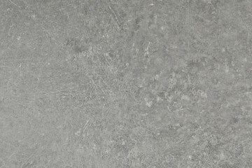 Grey concrete textured surface as background, closeup