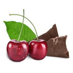 Fresh cherries and pieces of dark chocolate isolated on white
