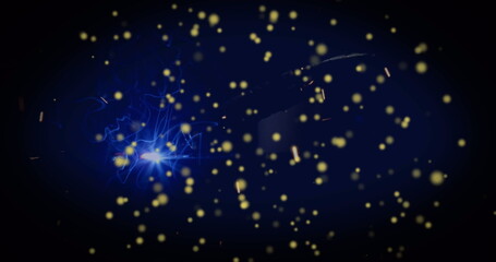 Fototapeta premium Image of moving spots over sparks